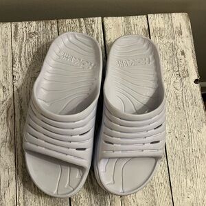 White Hoka slides